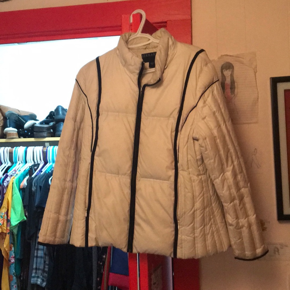 A white girl’s winter coat with insulated lining.